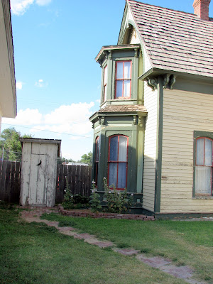 Even nice houses in the middle of town had outhouses.  Between that and the slaughter houses.. whew!