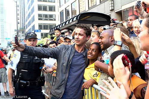 Shia LaBeouf with fans on  Michigan Ave