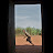Rwandese child running past open door Rwandese child running past open door