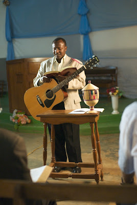 Guitar player at chapel service