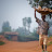 Boy carrying produce on his head