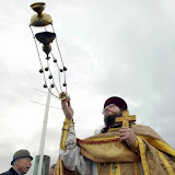 Father Christopher Swanson takes part in Theophany rituals Tuesday at Oyster Plant Park in Poulsbo. (Larry Steagall | Kitsap Sun)