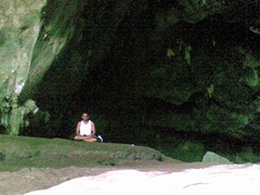 Myself meditating in the cave of Gelingga at Pahang during my off-grid living journey.