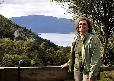tourist at scenic viewpoint on Mt. Haszard hiking trail in Waimangu Volcanic Valley