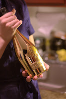 picture of the gold-plated bottle of the Armand de Brignac