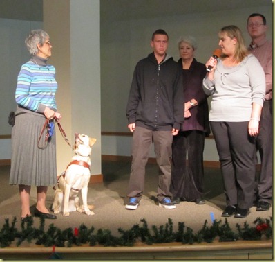 A photo of me speaking to Carol on stage at the graduation.