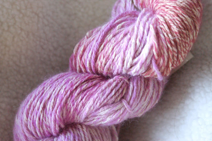One of my favorites - a recycled DK dyed with pokeberries - the marled effect comes from the blend of silk and angora in the yarn.