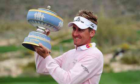 Ian Poulter of England celebrates after winning the WGC Accenture Match Play in Arizona