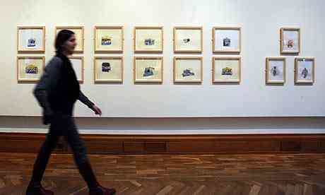 Olga Chernysheva walks past piece of her Artes Mundi exhibit
