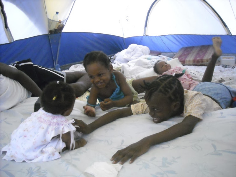 Children enjoying their new tent