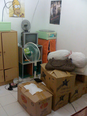 rumah mampang plus piles of boxes