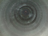 Underneath the bell of a rocket engine