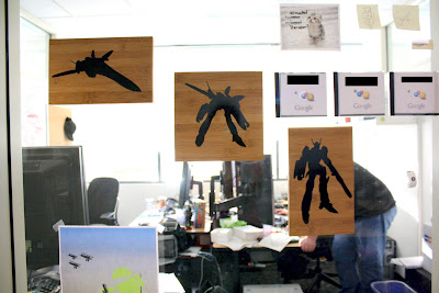 The three panels hanging outside my office