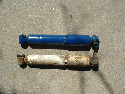 Then its real easy.  Take the bolts out and the old shock slides right out, and the new one is ready to go in!