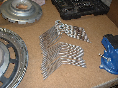 You can either try to straighten any bent spokes, or in my case I had a spare wheel cover I used for parts.
