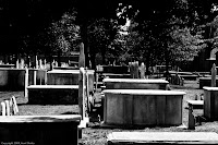 Christ Church Cemetery: This was taken at the Christ Church cemetery Annex where Benjamin Franklin was buried. The arrangement of the stones and the lighting presented an interesting scene, so I snapped it up. (1/3200 sec @ f/3.2; 50mm) Copyright 2009, Kerri Shotts
