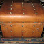 iron bound trunk belonging to Julia Ives Pack that made the pioneer trek - some straps on the front were rumored to be cut off to repair some harness