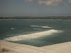Landing in Bali--the runway extends into the ocean, and right beside it is a reef surf break--but you'd better be good or else you'll get torn up.