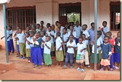 Tumaini children singing to visitors