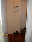 The entrance (as seen from bathroom) with the video intercom.