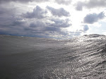 This is a fairly typical view of the stormy surf season on Lake Michigan. This is taken about 100 yards off the pier in a Northwesterly gale. This is kayak surfing season in southwest michigan. keithwikle.com