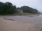 This creek is usually about 3 feet wide. The rain totally annihilated the beach and caused a class III white water area. I surfed my kayak on a small wave in this picture. keithwikle.com