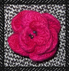 rosa feltre A felted flower brooch