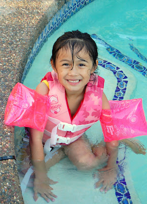 Khiara is learning how to swim.