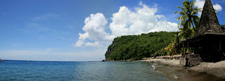 The natural color of the sand on the island is black from the volcano.