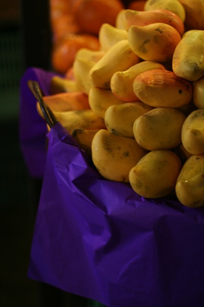 Yellow fruit and purple paper