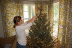 Bridget decorating the tree
