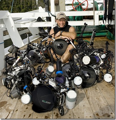 photographer Stephen Frink with array of Seacam housings during photo safari to Raja Ampat.