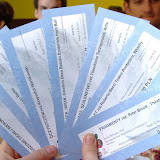 At the vegetarian restaurant, flaunting our free tickets!