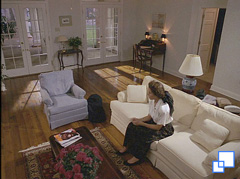 Ann sitting in her living room