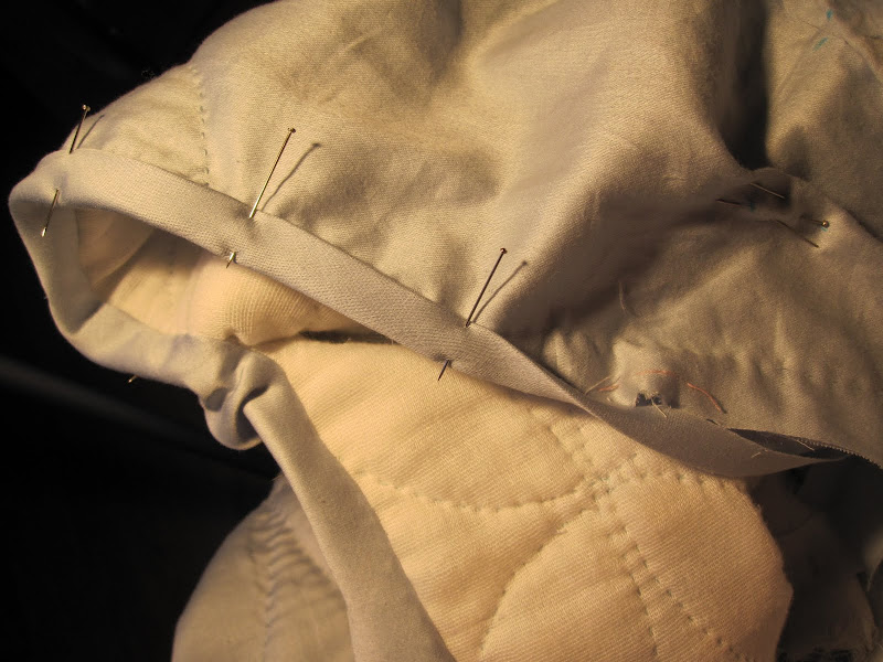 Finishing the bias binding for the pocket slits Finishing the bias binding for the pocket slits