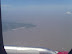 Approaching Shanghai Pudong Airport. We can see from far the DongHai bridge (????). is the longest cross-sea bridge in the world. It was completed on December 10, 2005. It has a total length of 32.5 kilometres (20.2 miles) and connects Shanghai and the offshore Yangshan deep-water port in China. Most of the bridge is a low-level viaduct. There are also cable-stayed sections to allow for the passage of large ships, largest with span of 420 m.