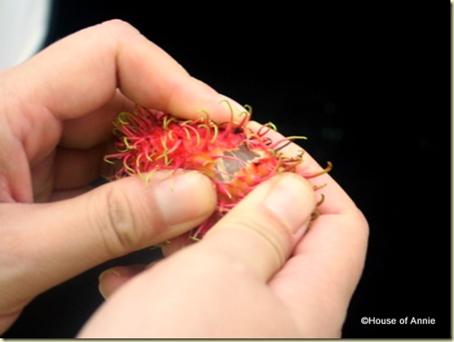 peeling a rambutan 1