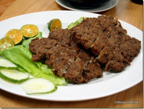 pan fried ground pork mixed with salted fish at penang seafood restaurant pan fried ground pork mixed with salted fish at penang seafood restaurant