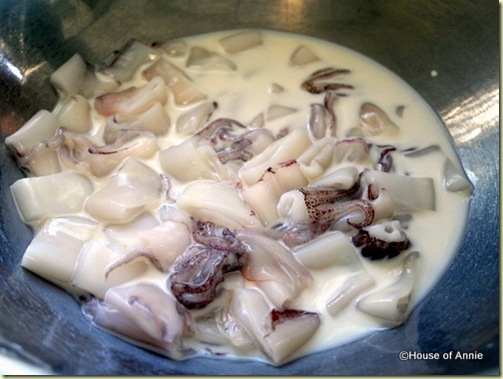 cut squid pieces in milk