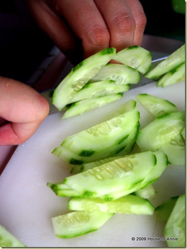 slicing cucumbers thinly