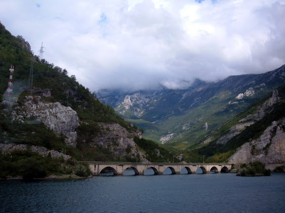 More mist on mountains, but this time over water and an old bridge