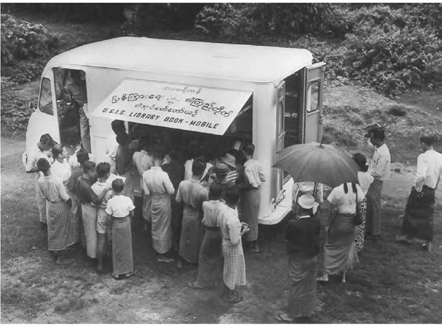 The USIA outreach techniques in rural areas included bookmobiles such as this one in Rangoon, Burma, 1953. 