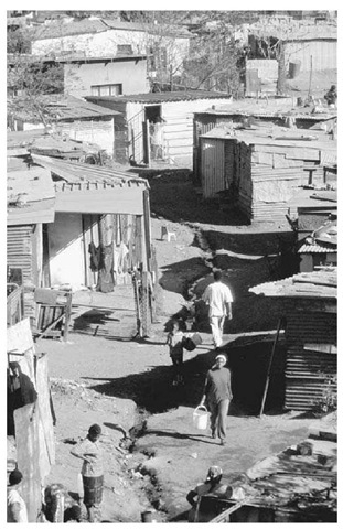 A Neighborhood in Soweto, South Africa. Soweto, a group of urban townships near Johannesburg, was built during South Africa's apartheid era. Many Soweto residents are poor and live in shacks in overcrowded neighborhoods like the one pictured here. 