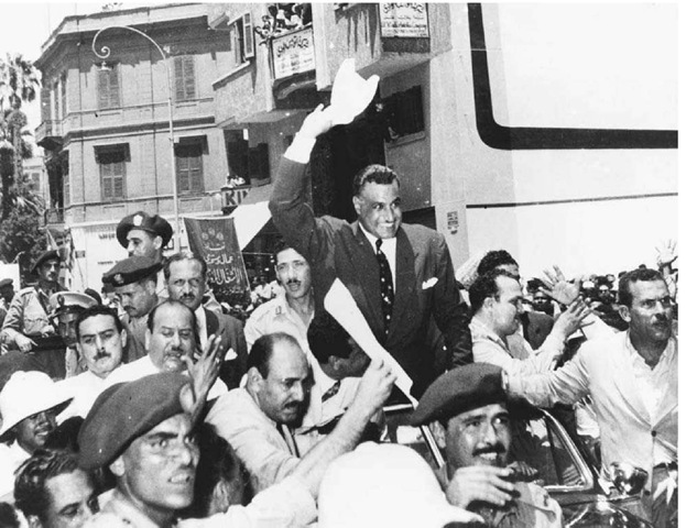Gamal Abd al Nasir. The Egyptian president (center) was greeted by cheering crowds when he returned to Cairo from Alexandria in 1956 after his announcement that he had nationalized the Suez Canal Company.