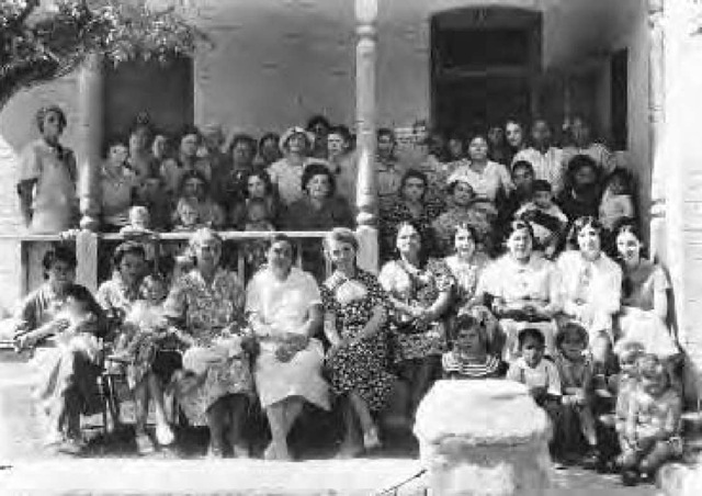 Margaret Sanger's work directly benefited thousands of women, like these with her at a Tucson, Arizona clinic in 1936