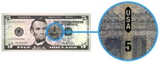 Security thread on the new $5 bill