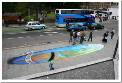 Make Poverty History (side view) - by Julian Beever