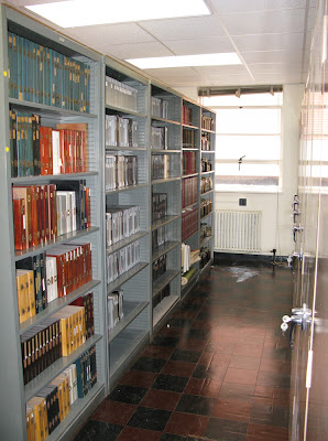 long row of slide boxes on shelves
