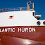 Atlantic Huron approaching the drawbridge on Welland Canal in St. Catharines (Ontario, Canada)