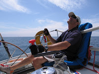 2008 Mackinac / Roger trimming mainsail on Excalibur, Monday afternoon